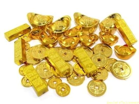zlatne poluge i novčići kao amajlije sreće
